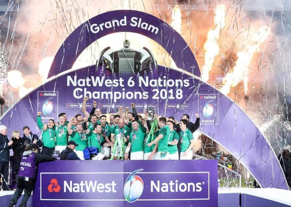 The Ireland team celebrate winning the Grand Slam
