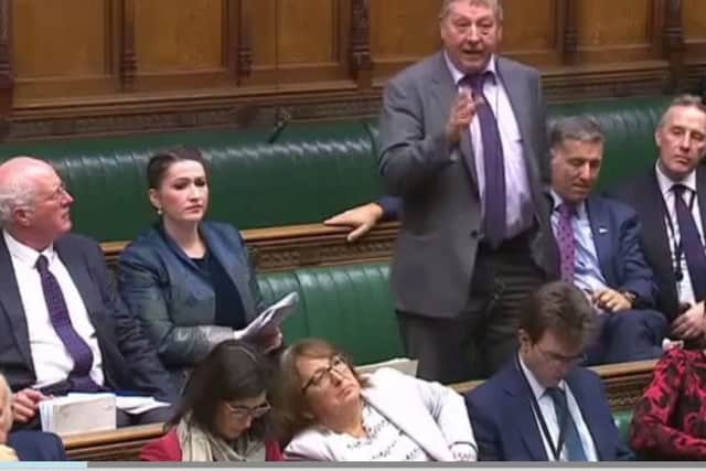 Sammy Wilson, MP for East Antrim, with DUP colleagues sitting around him, speaks in the House of Commons on Monday January 14 2019, on the eve of the vote on the Brexit Withdrawal Agreement