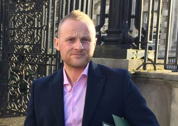Loyalist activist Jamie Bryson outside the High Court in Belfast as he has launched a High Court challenge against the legality of warrants used to search his premises. Photo: David Young/PA Wire