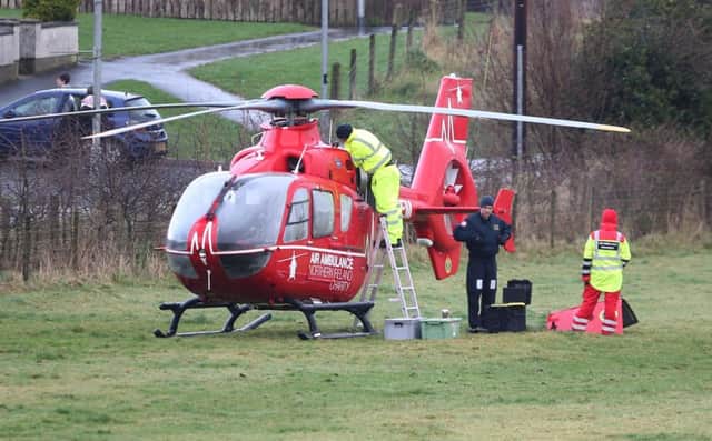 Engineers work on the air ambulance at the scene of a call-out to Articlave, Co Londonderry. Pic: Steven McAuley/McAuley Multimedia