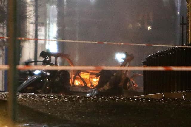 The mangled wreckage of the vehicle after a bomb exploded at Bishop Street, Londonderry