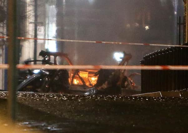 The mangled wreckage of the vehicle after a bomb exploded at Bishop Street, Londonderry