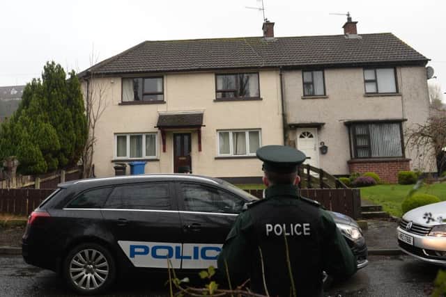 Police outside the house in Warrenpoint where gunmen shot dead Wayne Boylan. Alice Burns, who was injured in the attack, is fighting for her life in hospital. Pic by Colm Lenaghan/Pacemaker