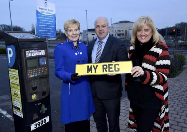 Lisburn and Castlereagh City Council has insisted the picture it issued on Friday of councillor Janet Gray MBE, Alderman James Tinsley and council director Heather Moore launching the new car parking meters was for illustrative purposes only and the roll-out of the scheme has not taken place