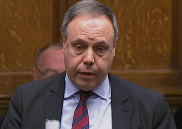 DUP deputy leader Nigel Dodds responds after Prime Minister Theresa May made a statement to MPs in the House of Commons