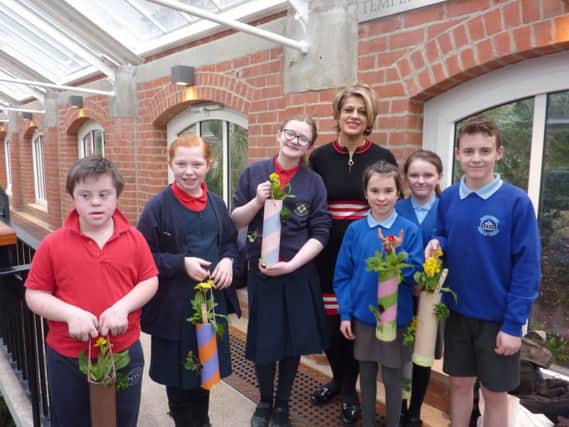 Pupils from Portstewart Primary and St. Colums Primary Schools enjoy planting with Belfast in Bloom and Rani Gill.
