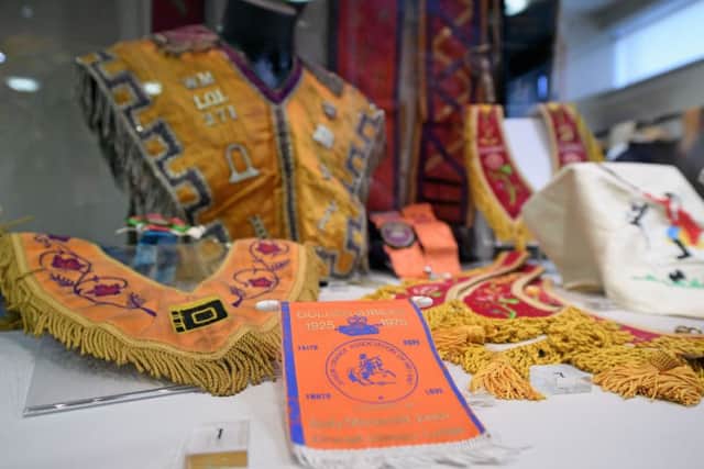 A variety of sashes, collarettes, tablecloths and handkerchiefs are among the many items on public display at the Museum of Orange Heritage in Belfast