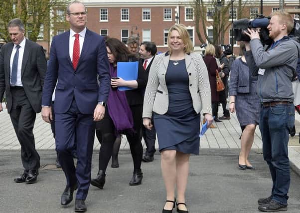 The Irish Tánaiste, Simon Coveney, left, and the

 Secretary of State Karen Bradley MP at Queen's University Belfast in 2018, the 20th anniversary of the Belfast Agreement. Dublin is often partisan on behalf of nationalists in the Stormont talks, London mostly neutral
