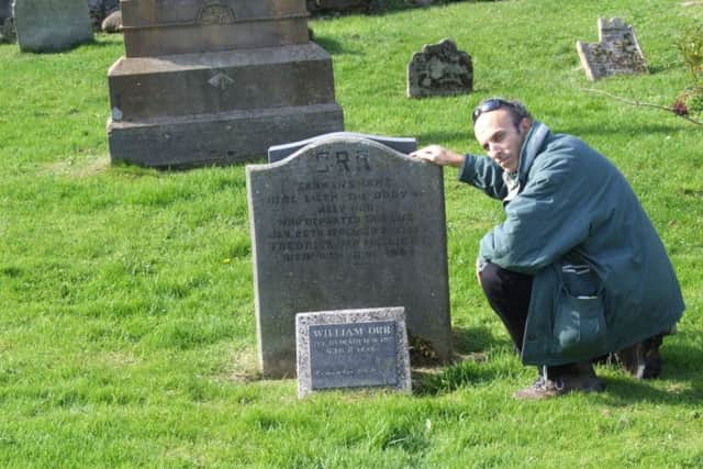 Guy Beiner at the graveside of William Orr