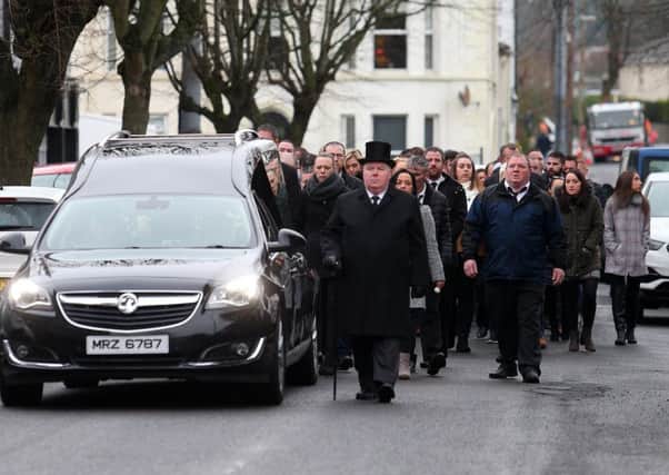 Mourners at the funeral of Wayne Boylan in Warrenpoint this morning.