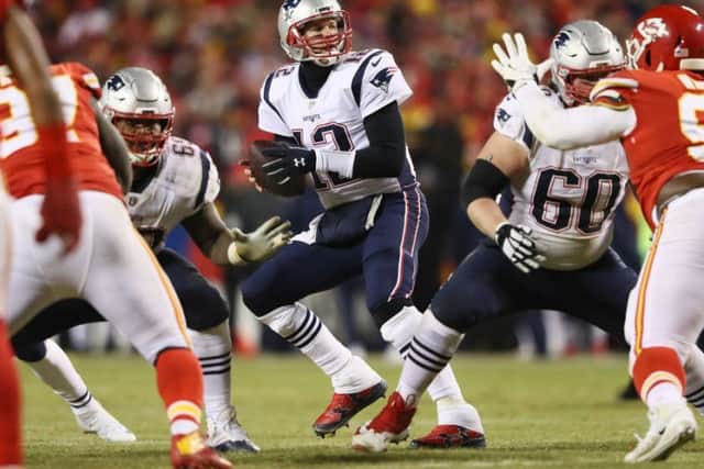 Tom Brady (#12) of the New England Patriots in action against the Kansas City Chiefs during the AFC Championship Game. Having beaten the Chiefs in over time the Patriots now take on the LA Rams at Super Bowl LIII. Photo by Jamie Squire/Getty Images