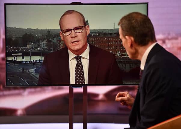 Irish foreign minister Simon Coveney being interviewed by host Andrew Marr on the BBC1 current affairs programme, The Andrew Marr Show