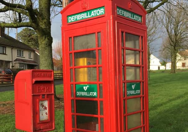 A phone box that now houses a defibrillator