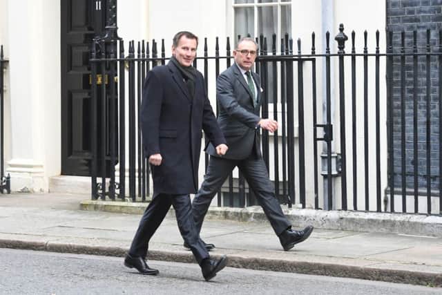 Foreign secretary Jeremy Hunt (left) and National Security Adviser Mark Sedwill arrive in Downing Street, London, for a cabinet meeting. Pic: Stefan Rousseau/PA Wire