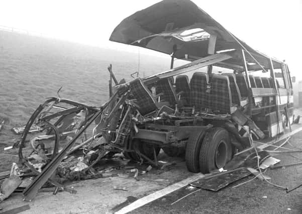 What remains of the rear end of the civilian coach which was carrying servicemen and their families on the M62 near Bradford in 1974 when an IRA bomb in the boot ripped it apart, killing 12 people.