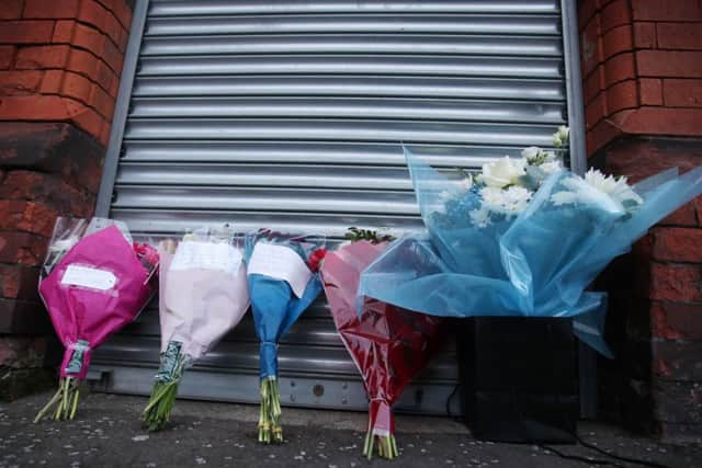 Flowers left at Cluan Place in east Belfast where 45-year-old Ian Ogle was killed on Sunday night.  Police have launched a murder investigation. 


Picture by Jonathan Porter/PressEye