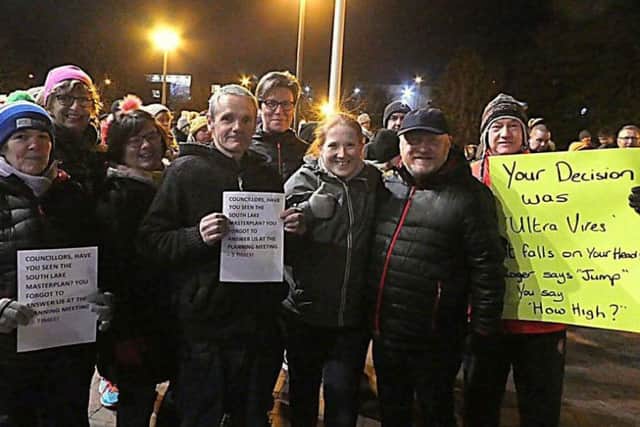 Protesters from the campaign group Save Craigavon City Park and Lakes at Craigavon Civic Centre on Monday night