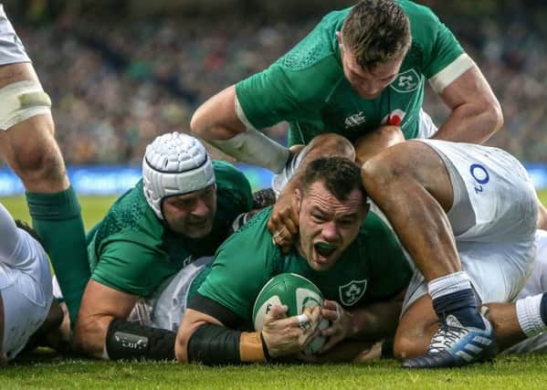 Ireland's Cian Healy goes over for a try against England