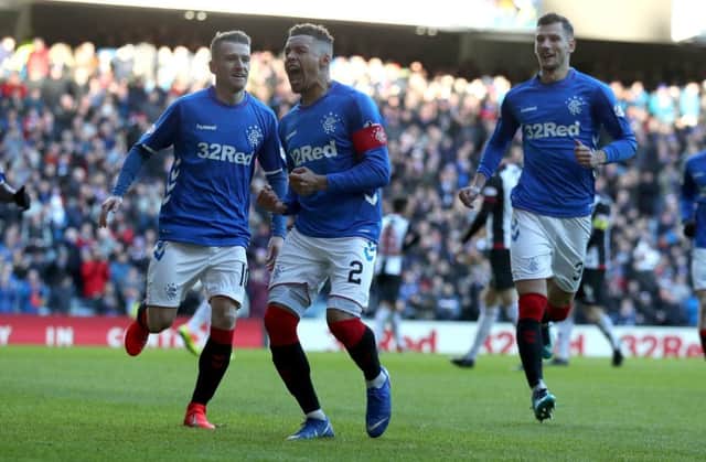 Rangers' James Taverrnier celebrates scoring his side's first goal of the game. Photo credit: Andrew Milligan/PA Wire