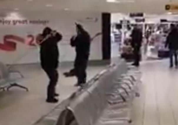 An image taken from the video footage of the fight in Belfast International Airport.