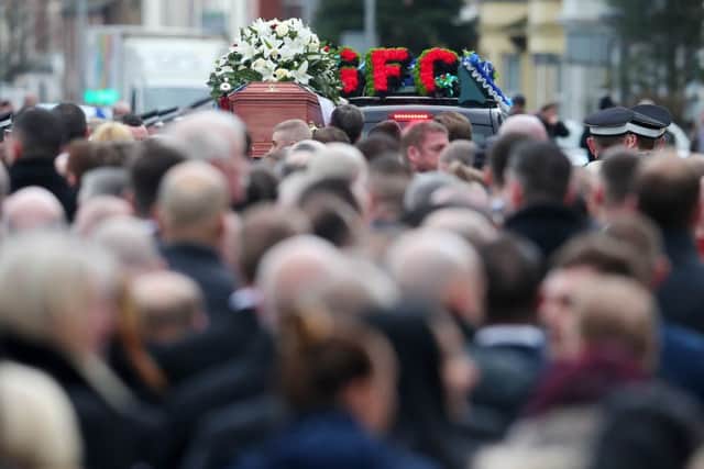 Ian Olge's coffin is carried along the Alberbridge Road after the funeral service. Picture by Jonathan Porter/PressEye