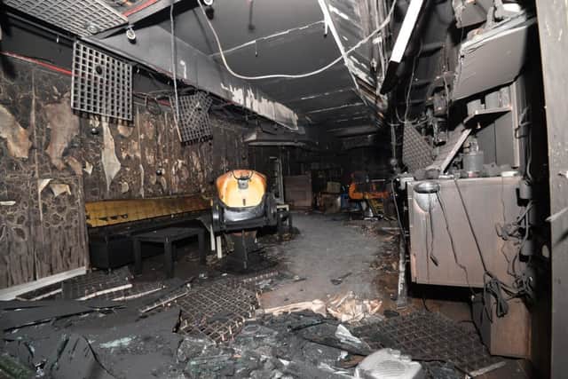 The inside of the shop has been gutted. 
Slight smoke damage was caused to the neighbouring buildings in the street. 
Police have said they are not treating the incident as a hate crime at this time.
Photo Colm Lenaghan/Pacemaker Press
