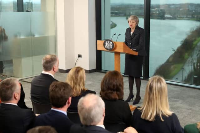 Britain's Prime Minister Theresa May delivers a speech at Allstate in Belfast on February 5, 2019. Photo: LIAM MCBURNEY/AFP/Getty Images