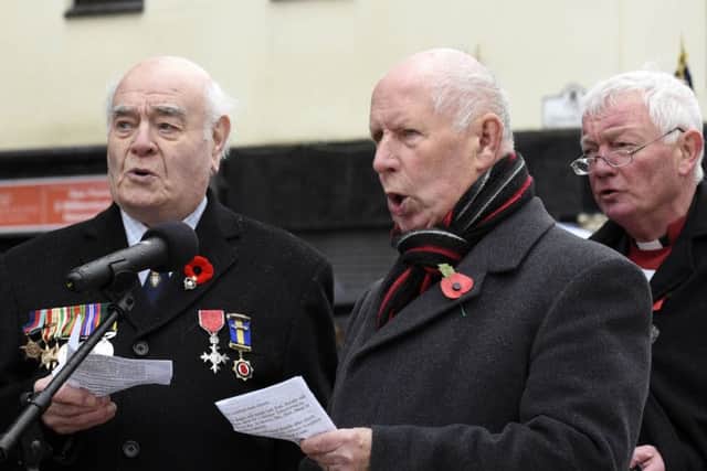 William Loughlin and Donald Hill lead the singing during Remembrance Service at the Londonderry War Memorial. INLS4515-134KM