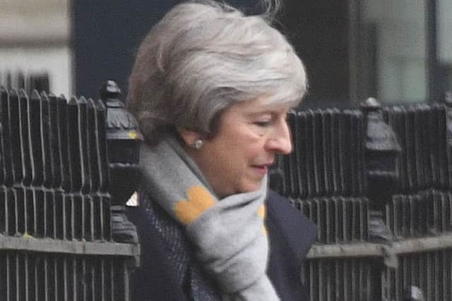 Prime Minister Theresa May leaving Downing Street to travel to Northern Ireland to make a high-profile speech