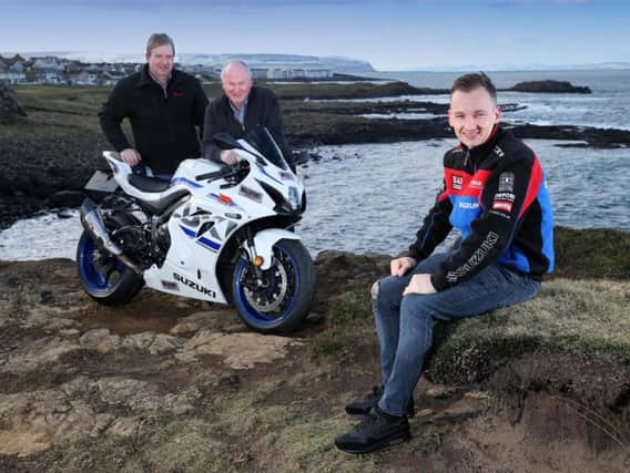 Richard Cooper with North West 200 Clerk of the Course Stanleigh Murrray and Event Director Mervyn Whyte on the North Coast last week.