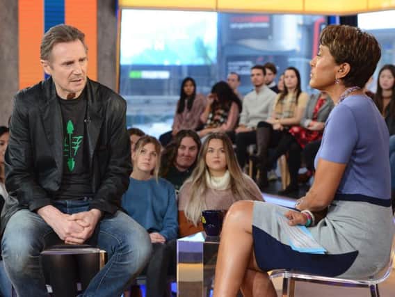 This image released by ABC shows Irish actor Liam Neeson, left, with co-host Robin Roberts on "Good Morning America," Tuesday, Feb. 5, 2019, in New York.