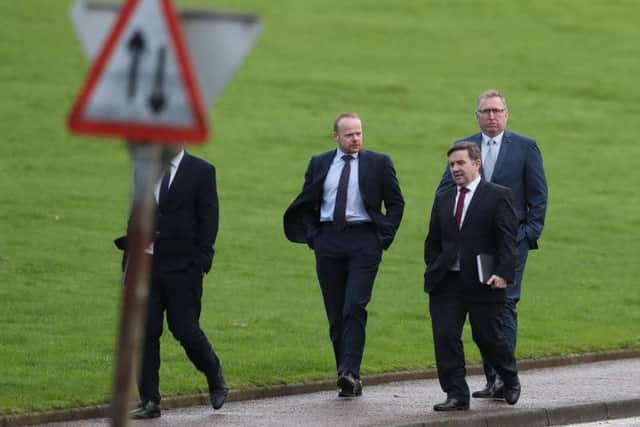 Ulster Unionist Party (UUP) leader Robin Swann (second right) and his party colleagues John Stewart (third right) and Doug Beattie arrive at Stormont for talks with Prime Minister Theresa May on the second day of her visit to Belfast.