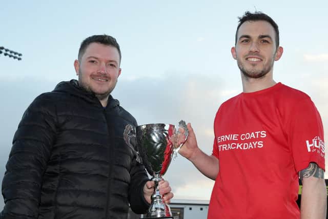 Charity match organisers Gary Dunlop and Nikki Coates with the William Dunlop Memorial Trophy.