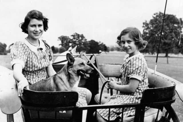 Princess Elizabeth and Princess Margaret in the garden of their wartime country residence (Windsor) where they are staying. Their greatest pleasure is the occasional visits of the King and Queen. In view of the petrol shortage their Royal Highnesses ponycart has again been brought into use.