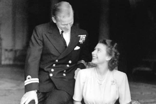 The engagement of Princess Elizabeth to Lieutenant Philip Mountbatten is announced and the happy young couple are pictured together at Buckingham Palace.