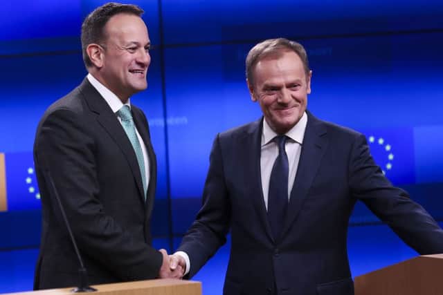 Taoiseach Leo Varadkar (left) shakes hands with European Council president Donald Tusk in Brussels yesterday after Mr Tusks remarks about a special place in hell for Brexiteers
