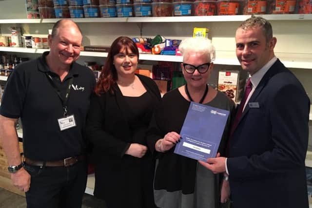 Alan McLachlan from Halifax, Lisburn and Gillian Boyd, Halifax Foundation trustee, with Via Wings founder Gail Redmond (second from right) and the charity's Dare 2 Care project team leader, Mike Masters (left).