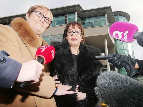 Ian Ogle's daughter, Toni (right), pictured outside Laganside Courts in Belfast on Friday morning. Included is UUP councillor, Sonia Copeland.