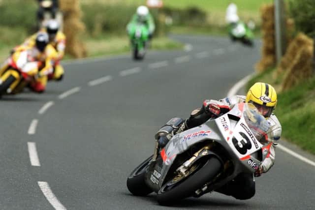 Joey Dunlop famously won the 1999 Superbike race at the Ulster Grand Prix on his ageing RC45 Honda against V&M Yamaha riders David Jefferies and Iain Duffus.