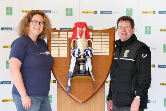 Elaine Haire, Knock branch manager along with Chris Peel Sullivan Upper Principal who made the quarter-final draw