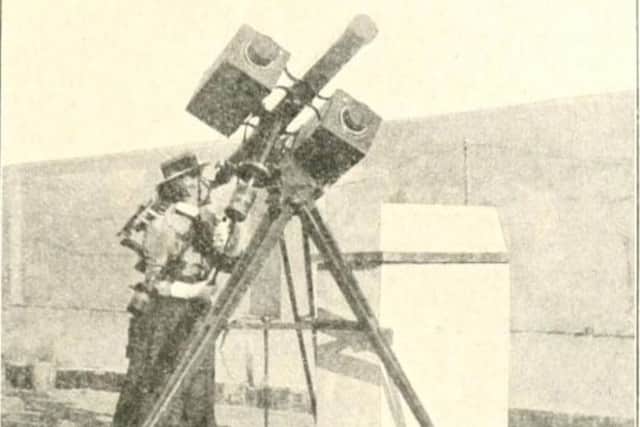 Annie Maunder at work with two astronomy cameras, 1900