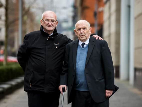 Robert 'Bobby' Clarke (right) who was the first person shot in the Ballymurphy Massacre, with Patsy Mullan, the brother of Father Hugh Mullan who was shot and died coming to the assistant of Mr Clarke, outside Belfast Coroner's Court ahead of inquest proceedings into the shootings in 1971.