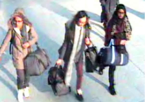 CCTV issued by the Metropolitan Police of (left to right) 15-year-old Amira Abase, Kadiza Sultana, 16, and Shamima Begum before catching a flight to Turkey in 2015 to join the Islamic State group. Shamima Begum is now heavily pregnant and wants to come home.