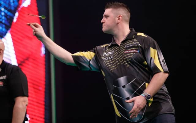 Daryl Gurney in action against Glen Durrant in the  Unibet Premier League. PICTURE: Steve Welsh/PDC
