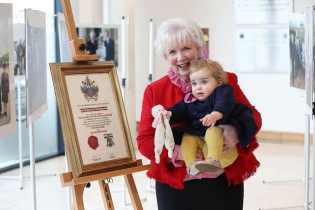 The Honorary Freedom of the City of Lisburn and Castlereagh was bestowed on Mrs Joan Christie CVO OBE at Lagan Valley Island in Lisburn, in recognition of her dedication, service and support to the area as Her Majesty's Lord Lieutenant for Co Antrim.

 Mrs Christie is pictured with her grand-daughter Rose after the ceremony.

Photo by Kelvin Boyes / Press Eye