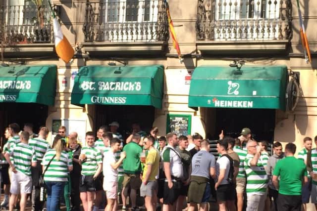 Celtic supporters outside St Patrick's bar in Valencia, Spain, where fans have claimed that they were hurt after being attacked with batons, riot shields and rubber bullets by police ahead of the club's Europa League game against the Spanish team Valencia on Wednesday. Fans.