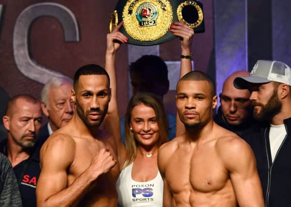 James Degale and Chris Eubank Jr during the weigh in at the The O2