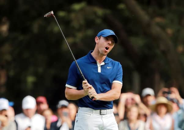 Rory McIlroy reacts on the 15th green during the third round of World Golf Championships-Mexico Championship.