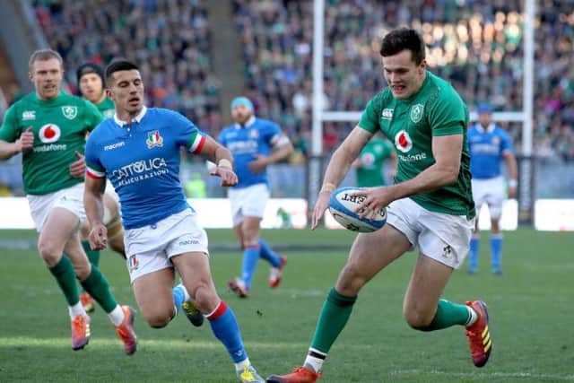 Jacob Stockdale scores a try for Ireland against Italy