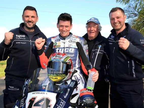 Dan Kneen with his Tyco BMW team at the Tandragee 100 in 2018.
